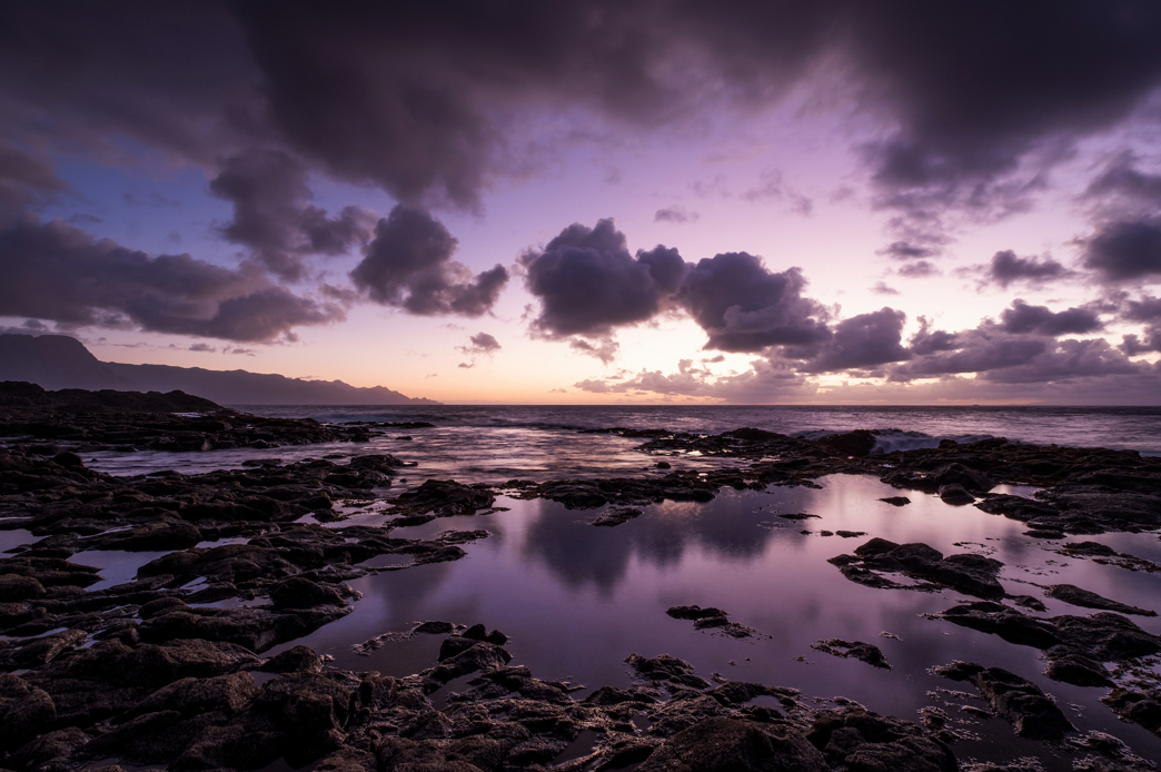 Photo of the Sky and the Ocean with Rocks Shot by Tamron 11-20mm F2.8